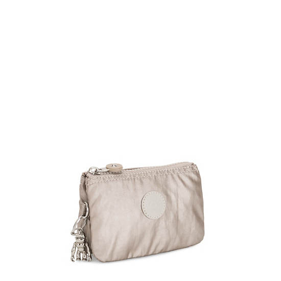 Bolsas Kipling Creativity Small Metallic Pouch Beige | MX 2108CT